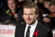 Former England soccer captain and UNICEF Goodwill ambassador David Beckham attends the world premier of the film "The Class of 92" in London December 1, 2013. REUTERS/Neil Hall