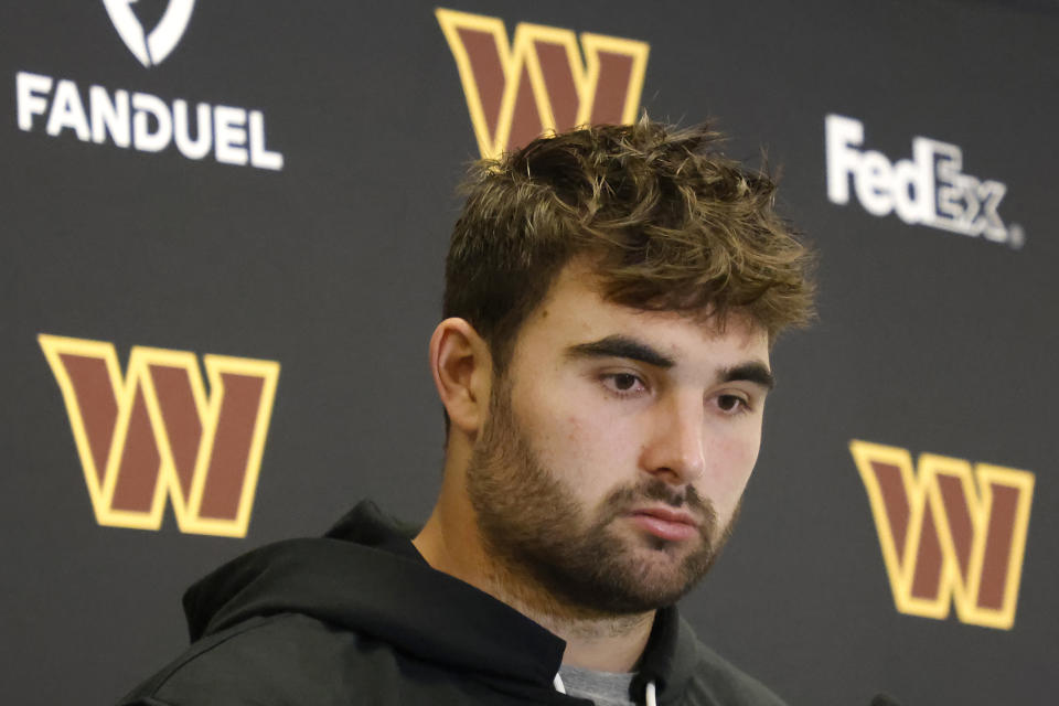 Washington Commanders quarterback Sam Howell speaks to reporters after an NFL football game against the Dallas Cowboys Thursday, Nov. 23, 2023, in Arlington, Texas. (AP Photo/Michael Ainsworth)