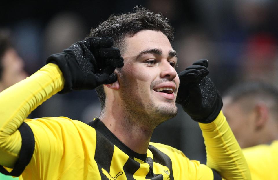 Gio Reyna celebrates his second straight winner for Borussia Dortmund. (Photo by DANIEL ROLAND/AFP via Getty Images)