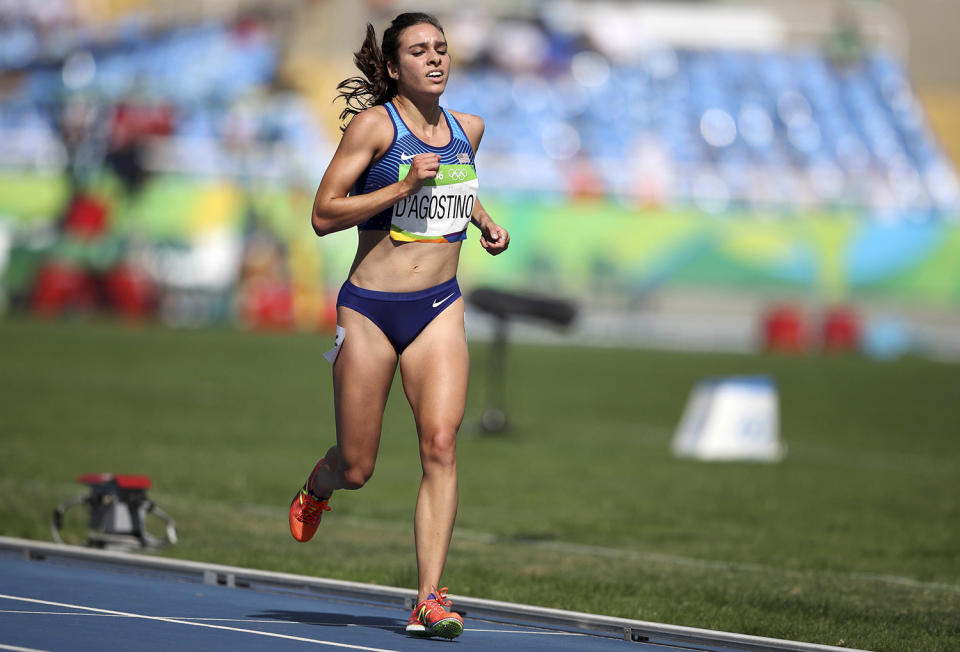 <p>Abbey D’Agostino competes in the women’s 5000m round 1 race at the Olympic Stadium on August 16, 2016. (REUTERS/Phil Noble) </p>