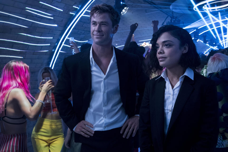 This image released by Sony Pictures shows Chris Hemsworth, left, and Tessa Thompson in a scene from Columbia Pictures' "Men in Black: International." (Giles Keyte/Sony/Columbia Pictures via AP)