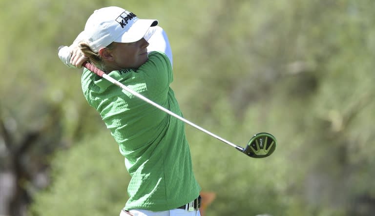 Stacy Lewis hits her drive on the third hole during the second round of the Founders Cup in Phoenix, Arizona