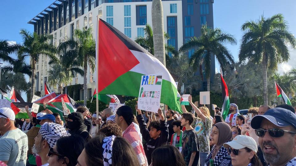 Hundreds of protesters gathered Sunday on Okeechobee Boulevard in West Palm Beach to demonstrate for the Palestinian cause in the wake of the Israel-Hamas conflict.