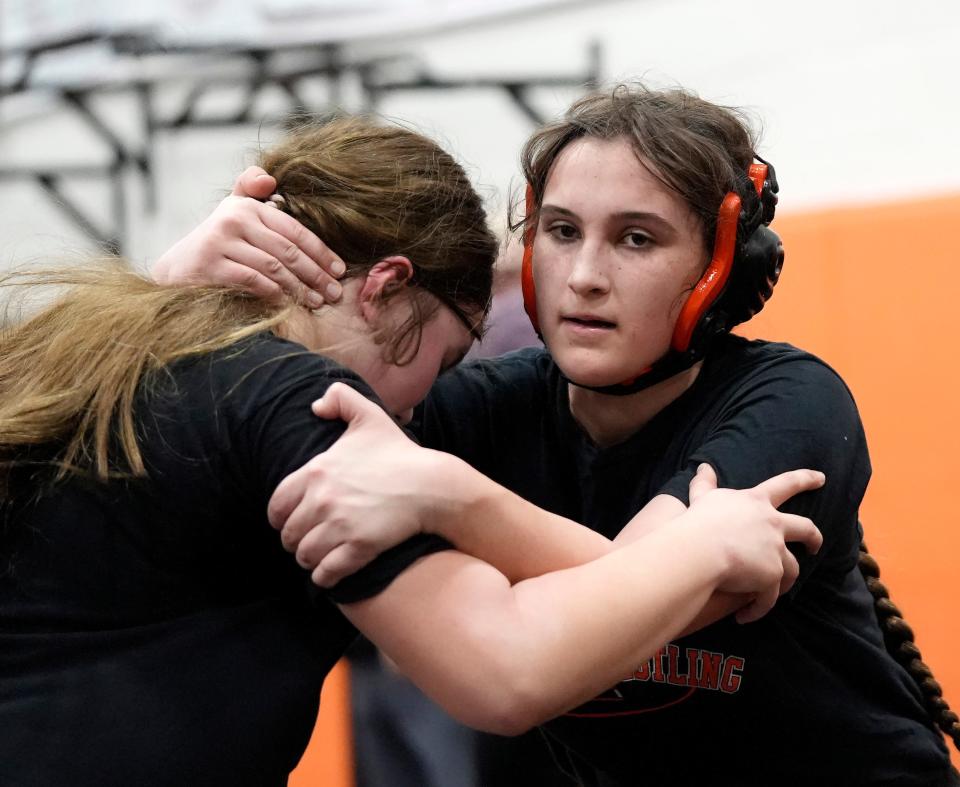 Delaware Hayes wrestler Evelyn Krauss spars with a teammate in practice on Wednesday.