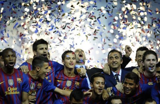 El Barcelona, vencedor de la Copa del Rey, recibe el jueves (20h30 GMT) al Real Madrid, campeón de Liga, poniendo fin a tres años de dominio azulgrana, en el partido de ida de la Supercopa de España, la primera entrega de esta temporada del gran clásico español de fútbol. (AFP | rafa rivas)