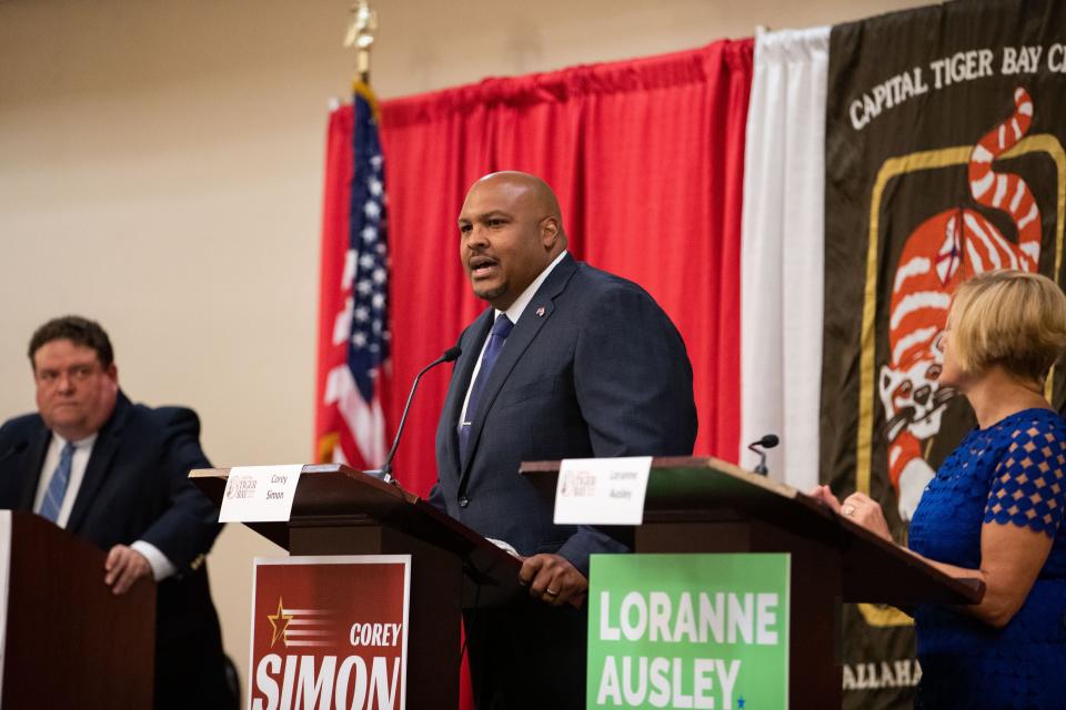 Senate District 3 candidate Corey Simon responds to a question posed by debate moderator Gary Fineout as he debates his opponent Sen. Loranne Ausley on Monday, Oct. 3, 2022.
