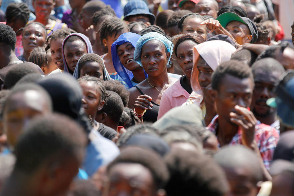 food hunger crowd people crowd (Odelyn Joseph / AP)