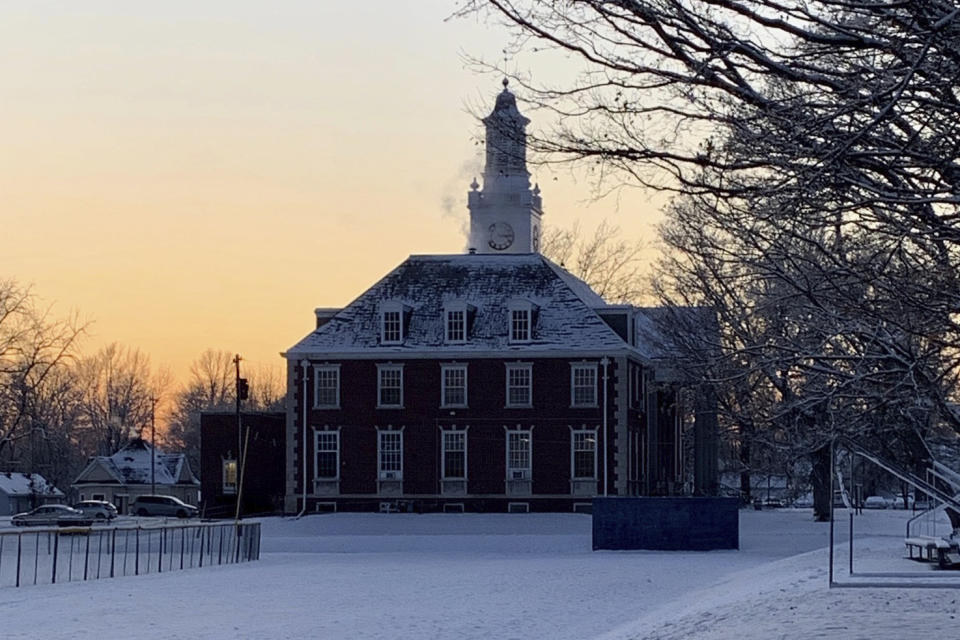 This February 2020 photo provided by Jamie Bolker shows MacMurray College's Henry Pfeiffer Library in the snow at sunset in Jacksonville, Ill. While the school’s financial troubles were a long time in the making _ fueled by declining enrollment, an inadequate endowment and competition _ MacMurray spokesman James Prescott said the unlikely prospect of securing funding during or after the economically crippling COVID-19 pandemic helped seal the school’s fate. (Jamie Bolker via AP)