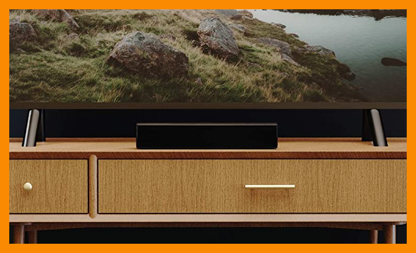 Big screen TV on a wooden console