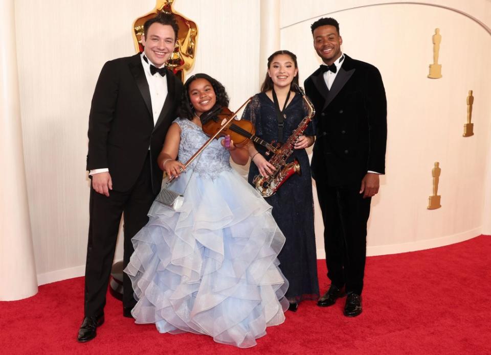 Ben Proudfoot (L), Kris Bowers (R), and guests 96th Annual Academy Awards, Arrivals, Los Angeles, California, USA - 10 Mar 2024