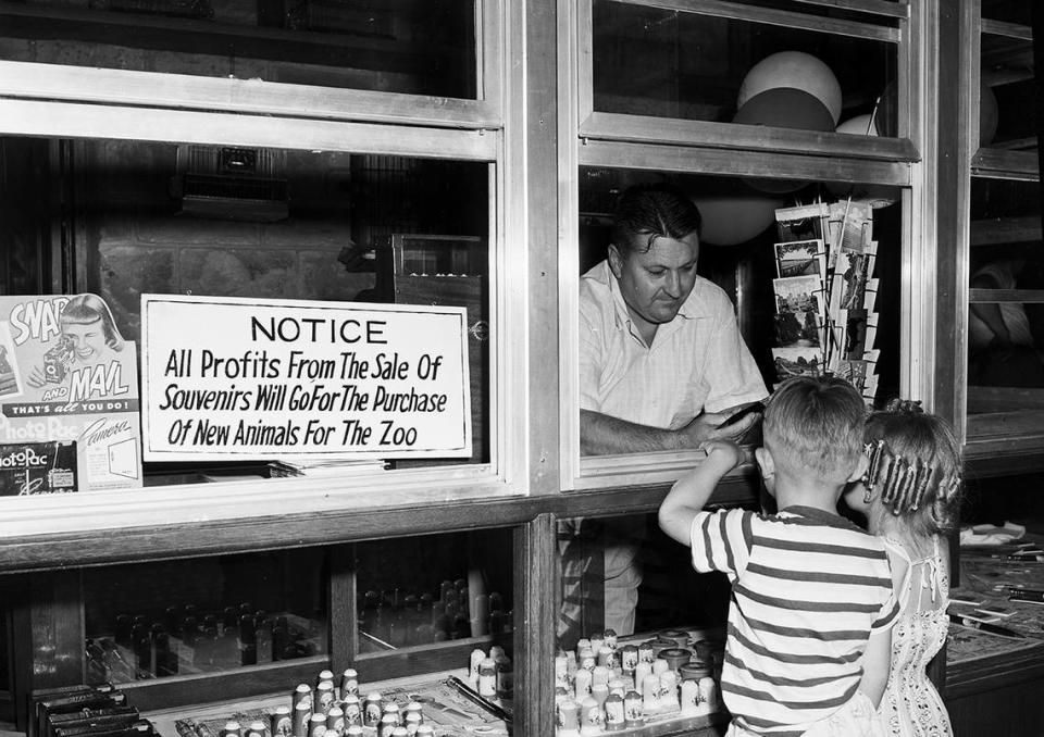 June 10, 1950: Merle Ann, 5, and David Conoley, 6, of Amarillo, were advance customers at the new souvenir stand in Forest Park Zoo. Zoo director Hamilson “Ham” Hittson is shown behind the counter.