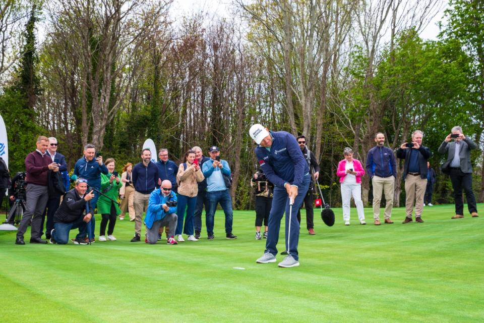 Padraig Harrington hits the first putt on the Marlay Putting Green