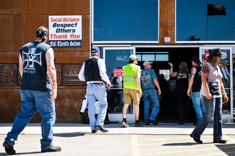 Sturgis motorcycle rally 2020 social distancing sign coronavirus