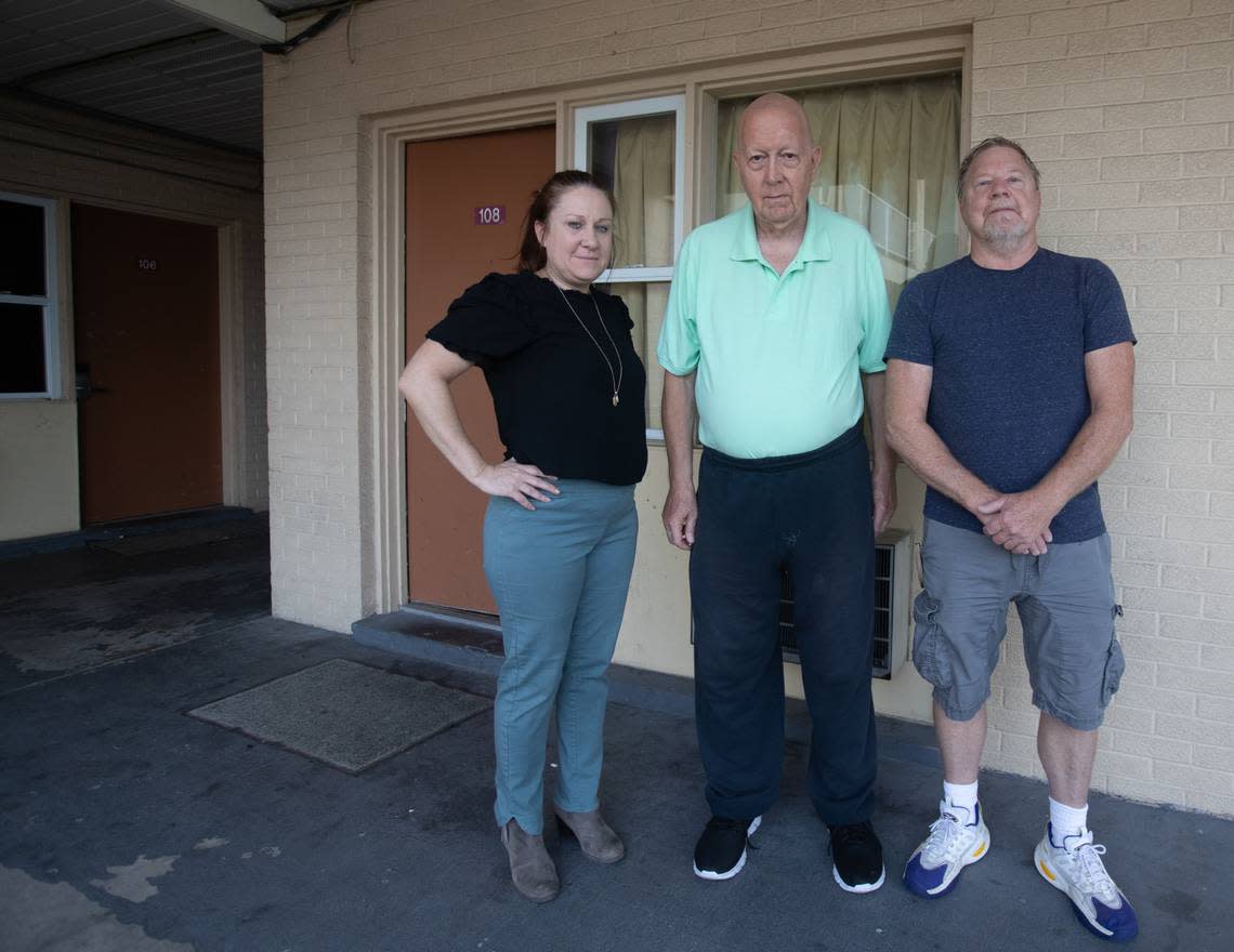 Diane Burrelsman, left, and Chuck Wood, right, helped David Semrau with back taxes and home improvements for six years before he was evicted in May. They see it as an extension of their Christian faith.