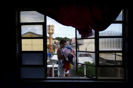 Laid-off worker of Comperj, Vanila da Conceicao, 54, who is unemployed since last October, is pictured at her house Itaborai March 31, 2015. REUTERS/Ricardo Moraes