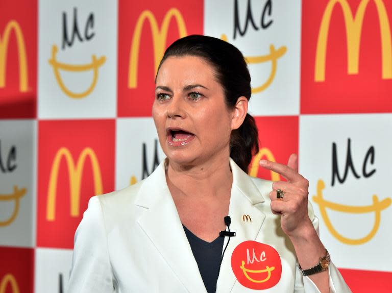 McDonald's Japan president Sarah Casanova announces the new business strategy and menu at a restaurant in Tokyo on May 21, 2015