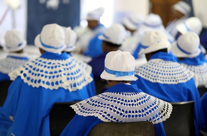 Faithful worship during a church service amid concerns about the spread of coronavirus disease (COVID-19) at the Apostolic Christian Church in Kagiso