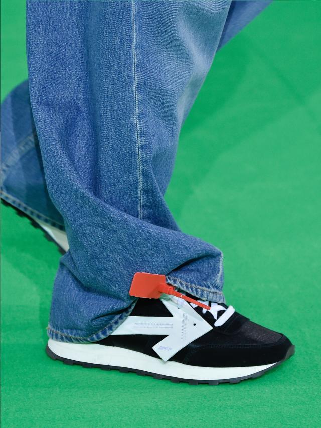 Virgil Abloh Wears Off-White x BAPE Sneaker On Louis Vuitton Runway