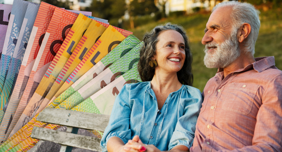 Wad of Aussie cash behind a retired couple