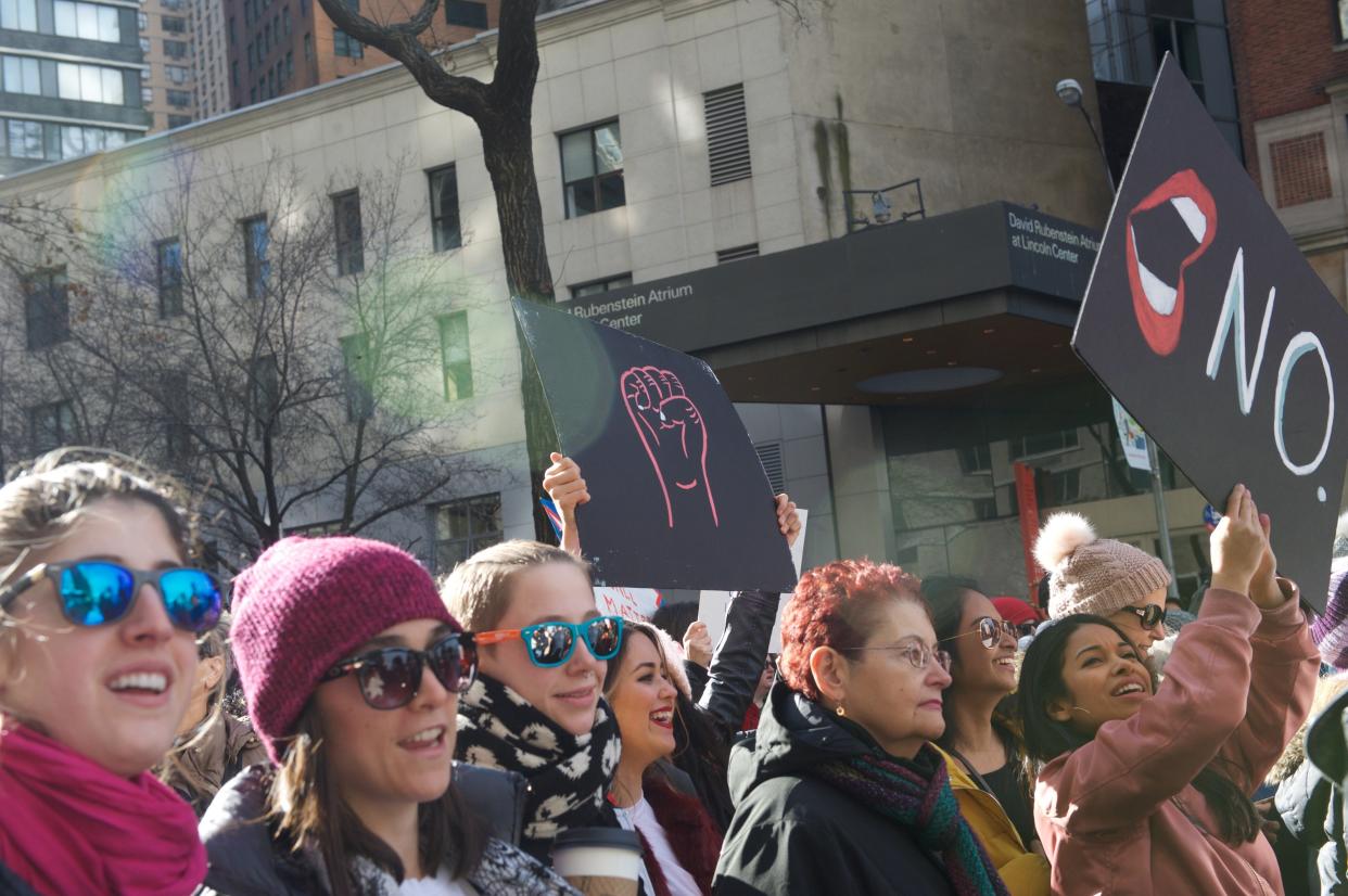 Marchers chant and hold up signs at the 2018 Women's March in New York City. (Photo: Alanna Vagianos/HuffPost)