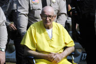 <p>Edgar Ray Killen is escorted int o the Neshoba County Courthouse before sentencing June 23, 2005 in Philadelphia, Mississippi. Killen , 80, was convicted on June 21, 2005 in the 1964 murders of civil rights activists Andrew Goodman, James Chaney and Michael Schwerner. He received three consecutive 20 year sentences for the murders. (Photo: Marianne Todd/Getty Images) </p>