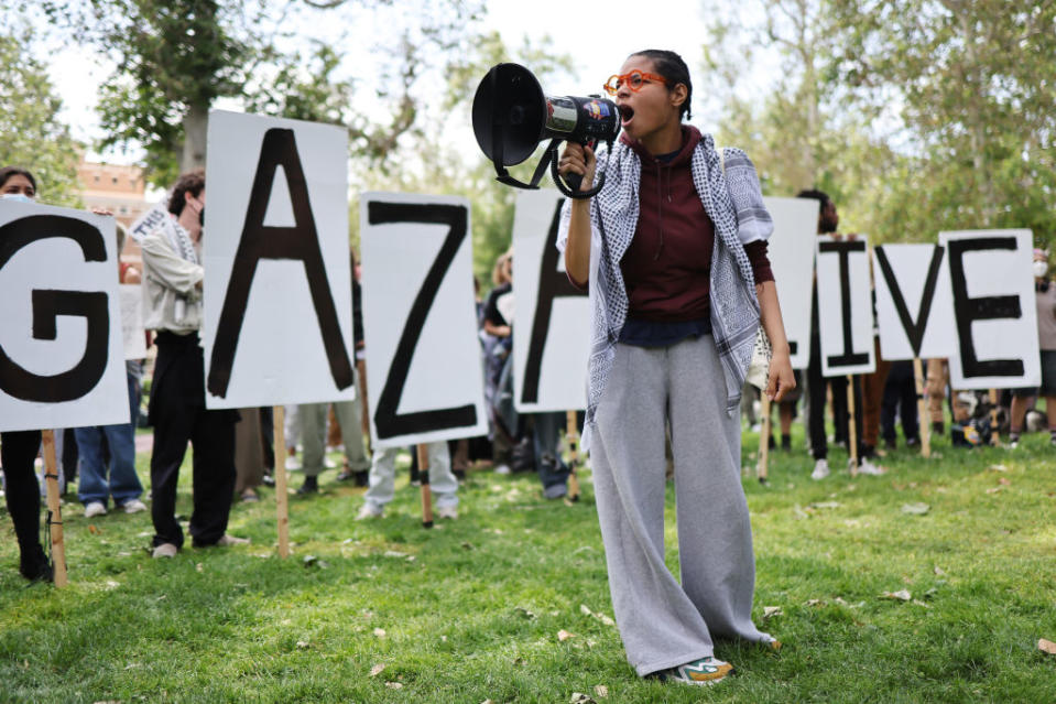 Pro-Palestine demonstrators rally at an encampment in support of Gaza at the University of Southern California on April 24, 2024 (Mario Tama/Getty Images)