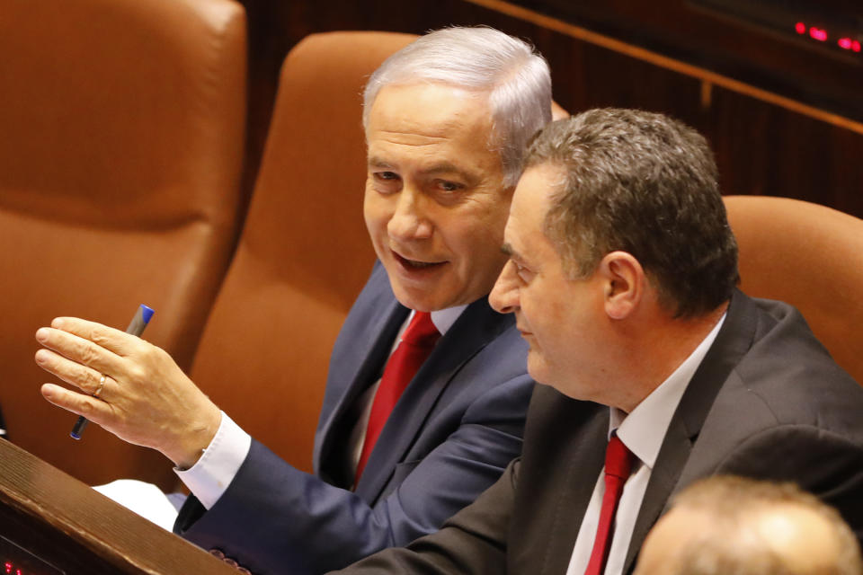 Israeli Prime Minister Benjamin Netanyahu before voting in the Knesset, Israel's parliament in Jerusalem, Wednesday, May 29, 2019. Israel's parliament has voted to dissolve itself, sending the country to an unprecedented second snap election this year as Prime Minister Benjamin Netanyahu failed to form a governing coalition before a midnight deadline. (AP Photo/Sebastian Scheiner)