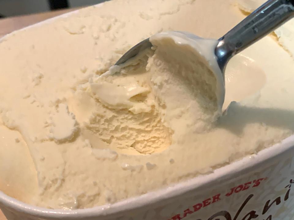 Scooping spooning out Trader Joe's vanilla ice cream