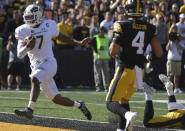 Colorado State quarterback Todd Centeio (7) runs for a touchdown during the first half of an NCAA college football game against Iowa, Saturday, Sept. 25, 2021, in Iowa City, Iowa. (AP Photo/Ron Johnson)