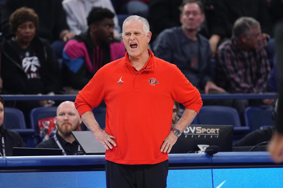 FILE - San Diego State head coach Brian Dutcher in the first half of an NCAA college basketball game Tuesday, Feb. 6, 2024, at Air Force Academy, Colo. Dutcher has experienced all 25 seasons of Mountain West basketball and he's never seen anything like this one. A season after Dutcher's San Diego State Aztecs became the first Mountain West team to reach the Final Four, the conference could have a record six teams reach the NCAA Tournament. (AP Photo/David Zalubowski,File)