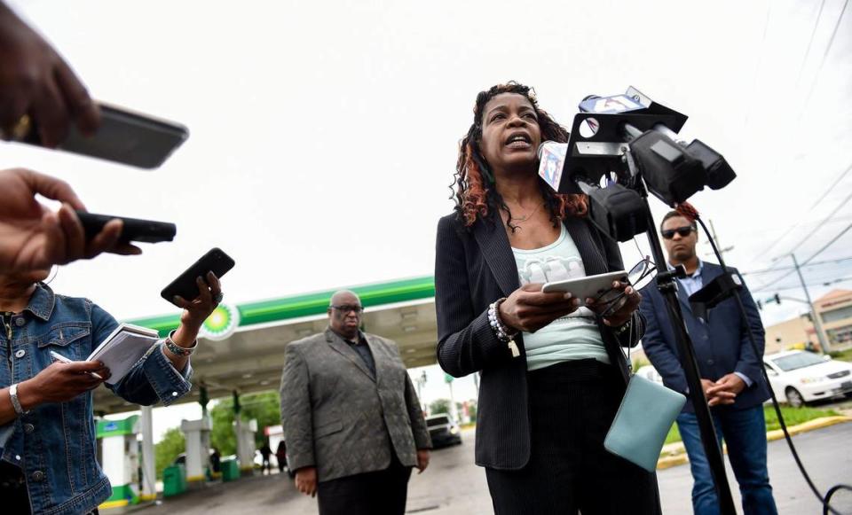 Khadijah Hardaway, lead organizer with Justice for Wyandotte, talks to the media Tuesday, June 1, 2021, after the family of Malcolm Johnson provided a video of the fatal shooting by police of Johnson at the BP gas station at E. 63rd and Prospect Avenue in March. Faith leaders, including Darron LaMonte Edwards, left, and Emanuel Cleaver III, right, called what they saw an “execution.”