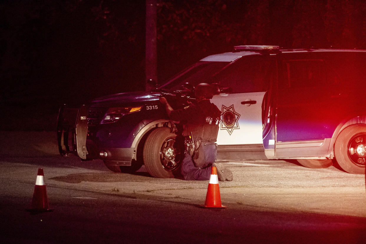 Police stay focused on a target after a deadly shooting at the Gilroy Garlic Festival in Gilroy, California (Picture: AP)