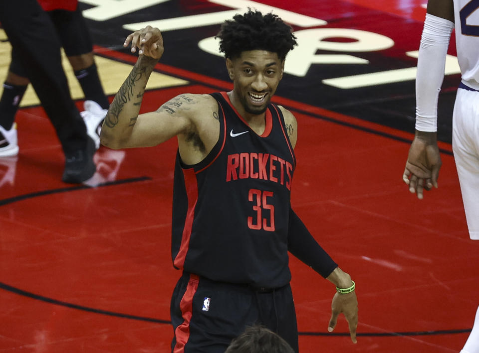 Houston Rockets center Christian Wood (35) reacts after a play against the Phoenix Suns during the second quarter of an NBA basketball game in Houston, Monday, April 5, 2021. (Troy Taormina/Pool Photo via AP)