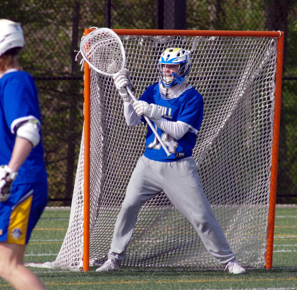 Sean Walsh in goal for Hull in a recent game against Abington. Walsh can be heard barking instructions to his teammates to encourage better play and work the defense. Hull coach Ed Cameron says Walsh is like having another coach in the game playing. May 9, 2023.
