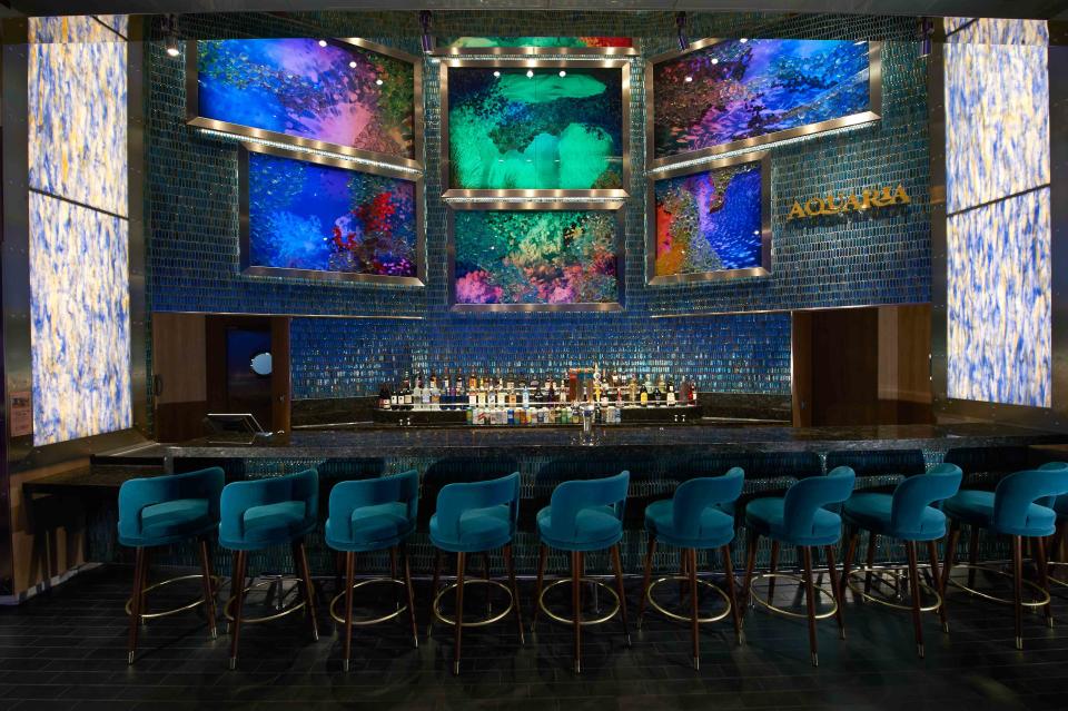 The Aquaria Bar is one of many food and beverage options on the ship.