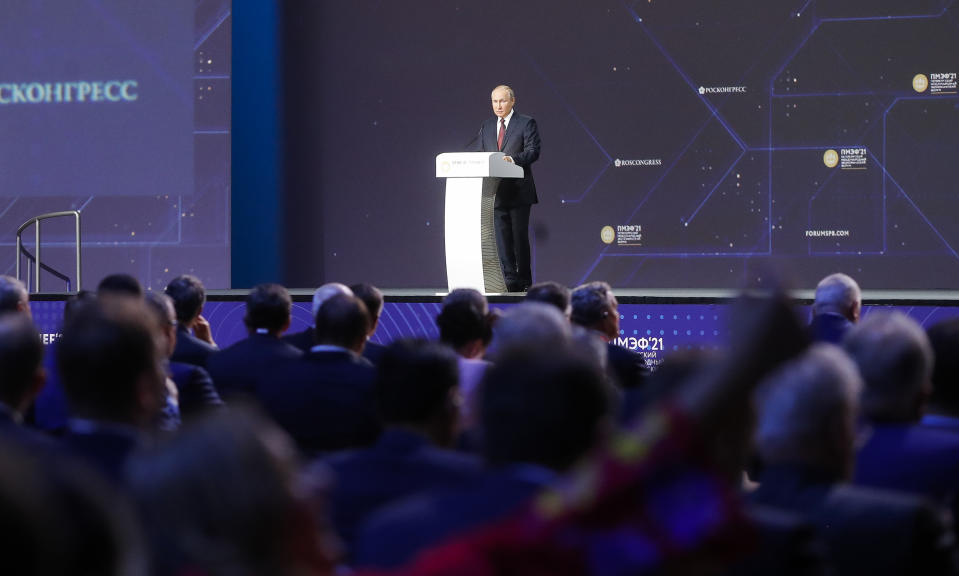 Russian President Vladimir Putin speaks at the St. Petersburg International Economic Forum in St. Petersburg, Russia, Friday, June 4, 2021. (AP Photo/Dmitri Lovetsky, Pool)