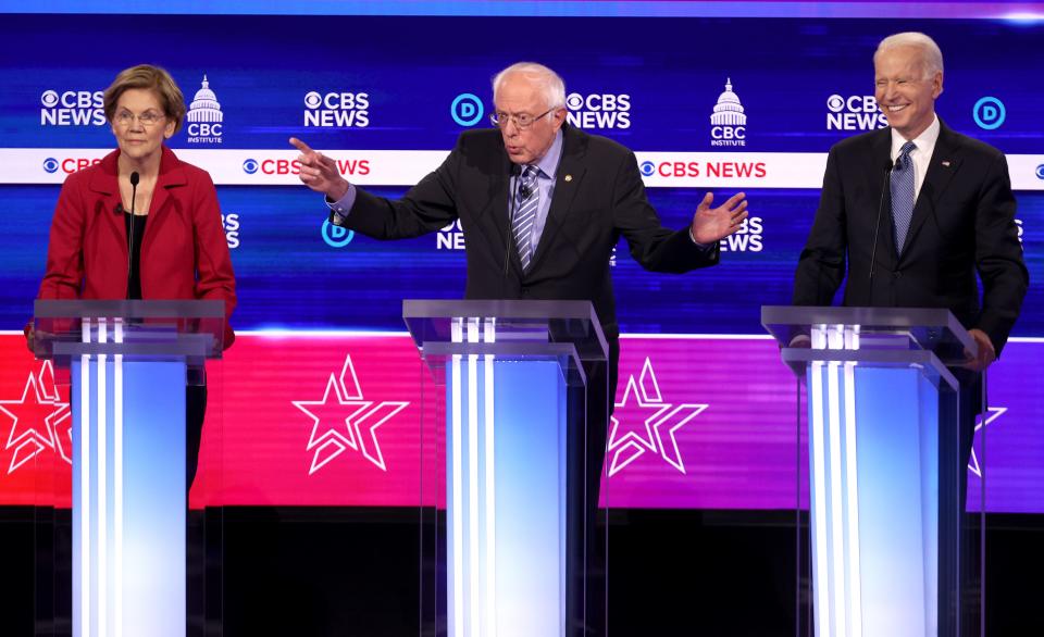 Sen. Bernie Sanders is center stage at the Democratic debate in Charleston, S.C., on Feb. 25, 2020.