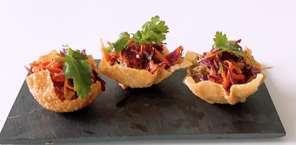 Ahi tuna tacos are served in homemade wonton wrappers at Lychee Bistro.