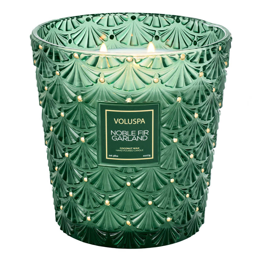 <p><a href="https://www.voluspa.com/products/noble-fir-garland-3-wick-hearth-candle" rel="nofollow noopener" target="_blank" data-ylk="slk:Shop Now;elm:context_link;itc:0;sec:content-canvas" class="link rapid-noclick-resp">Shop Now</a></p><p>Noble Fir Garland</p><p>voluspa.com</p><p>$78.00</p>