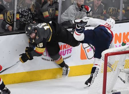 May 30, 2018; Las Vegas, NV, USA; Vegas Golden Knights left wing James Neal (18) collides with Washington Capitals defenseman John Carlson (74) in the third period in game two of the 2018 Stanley Cup Final at T-Mobile Arena. Stephen R. Sylvanie-USA TODAY Sports