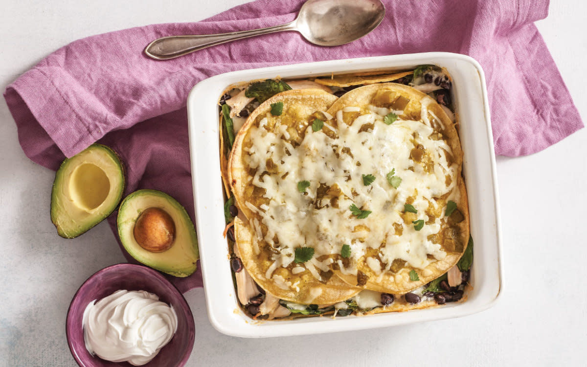 <p>Mark Boughton Photography</p><p>Stacked Green Chile Chicken Enchiladas is an easy weeknight meal that’s ready in 30 minutes! Skip the work of rolling individual <a href="/31311/firstpresbyterianchurch/chicken-enchiladas-for-a-crowd/" data-ylk="slk:enchiladas;elm:context_link;itc:0;sec:content-canvas" class="link rapid-noclick-resp">enchiladas</a>, and layer the <a href="/26608/donnaelick/30-minute-mexican-lasagna/" data-ylk="slk:tortillas;elm:context_link;itc:0;sec:content-canvas" class="link rapid-noclick-resp">tortillas</a> instead for a speedy any-night shortcut.</p><p><strong>Get the recipe: <a href="/1034490/parade/stacked-green-chile-chicken-enchiladas-recipe/" data-ylk="slk:Stacked Green Chile Chicken Enchiladas;elm:context_link;itc:0;sec:content-canvas" class="link rapid-noclick-resp">Stacked Green Chile Chicken Enchiladas</a></strong></p>