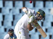 South Africa's captain Dean Elgar ducks under a delivery from India's bowler Jasprit Bumrah, during the fourth day of the Test Cricket match between South Africa and India at Centurion Park in Pretoria, South Africa, Wednesday, Dec. 29, 2021. (AP Photo/Themba Hadebe)