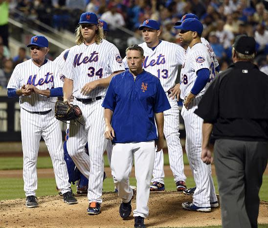 Mets starter Noah Syndergaard leaves with an undisclosed injury during Friday's game against the Nationals. (AP)