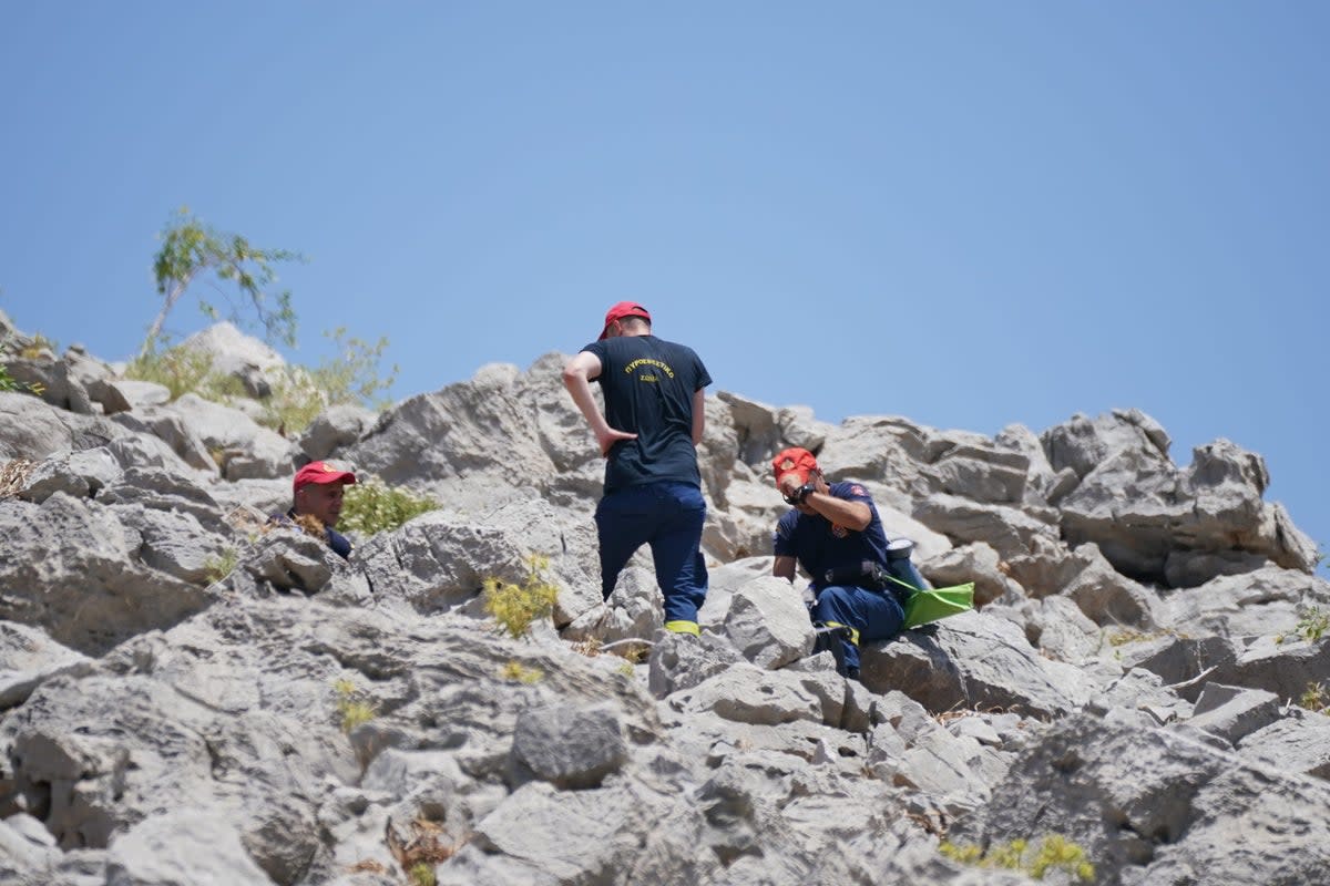 A search team looking for Michael Mosley in Symi (PA Wire)