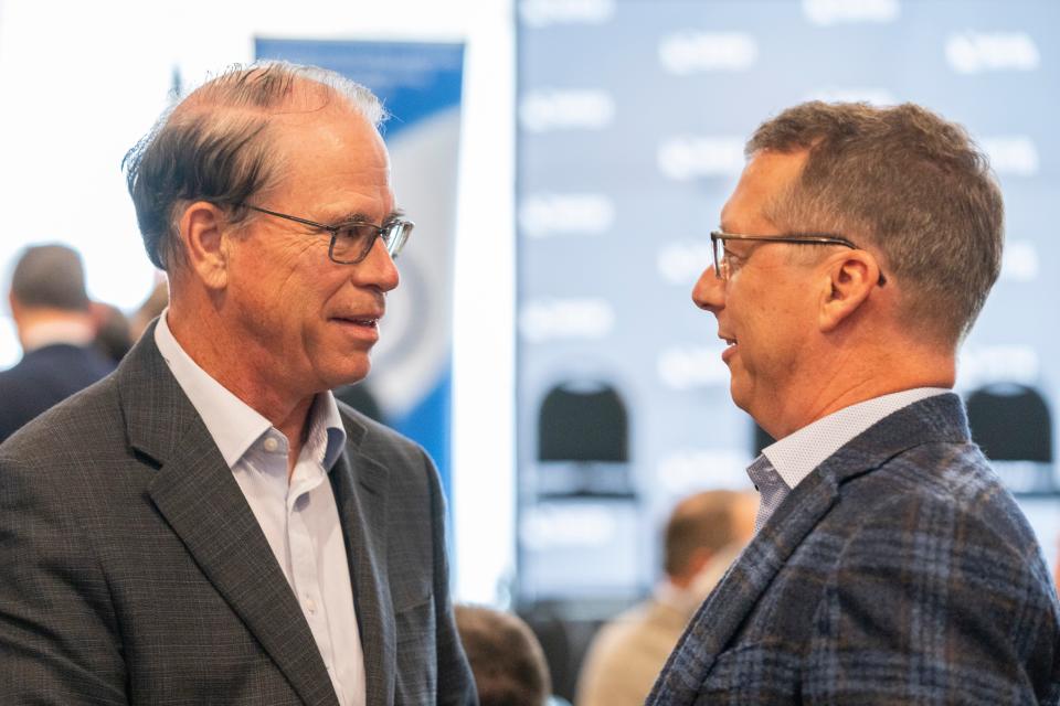 Sen. Mike Braun, left, and Eric Doden talk before the start of the National Federation of Independent Businesses gubernatorial candidate forum and luncheon on Tuesday, March 19, 2024, at the Wellington Fishers Banquet & Conference Center in Fishers, Indiana.