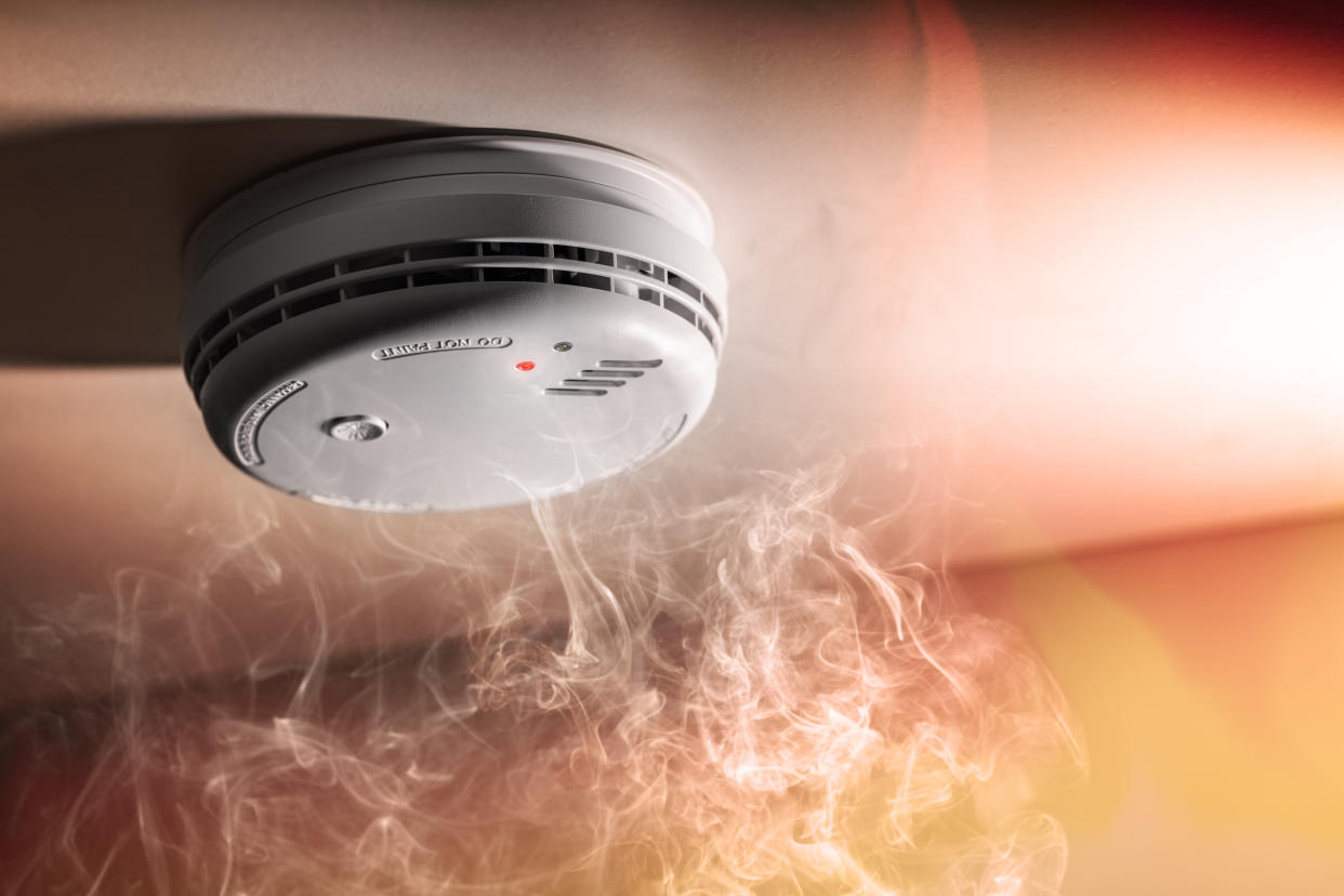Carbon monoxide detector with white smoke gas on ceiling, Carbon monoxide