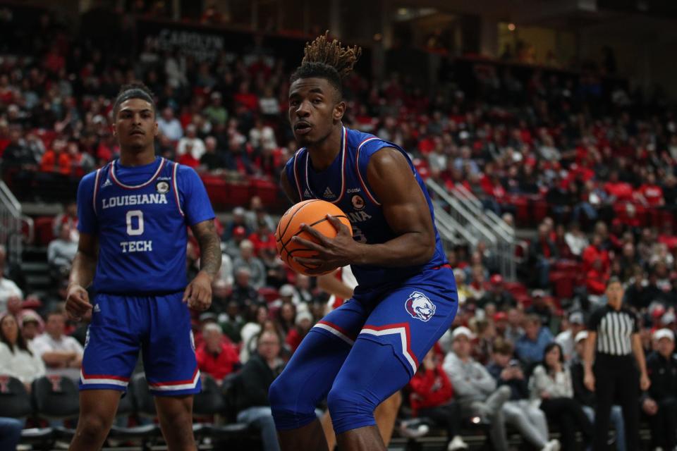 Nov 14, 2022; Lubbock, Texas, USA;  Louisiana Tech Bulldogs forward David Green (13) grabs a rebound against the Texas Tech Red Raiders in the second half at United Supermarkets Arena. Mandatory Credit: Michael C. Johnson-USA TODAY Sports