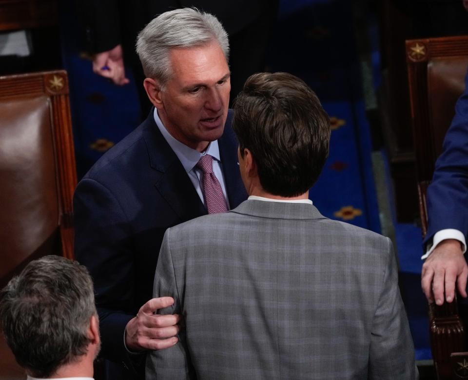 Jan 6, 2023; Washington, DC, USA;  Kevin McCarthy (R-Calif.) talks to Matt Gaetz (R-Fla.) during a session of the House of Representatives reconvened on Friday, Jan. 6, 2023, to elect a speaker of the House. Mandatory Credit: Jack Gruber-USA TODAY
