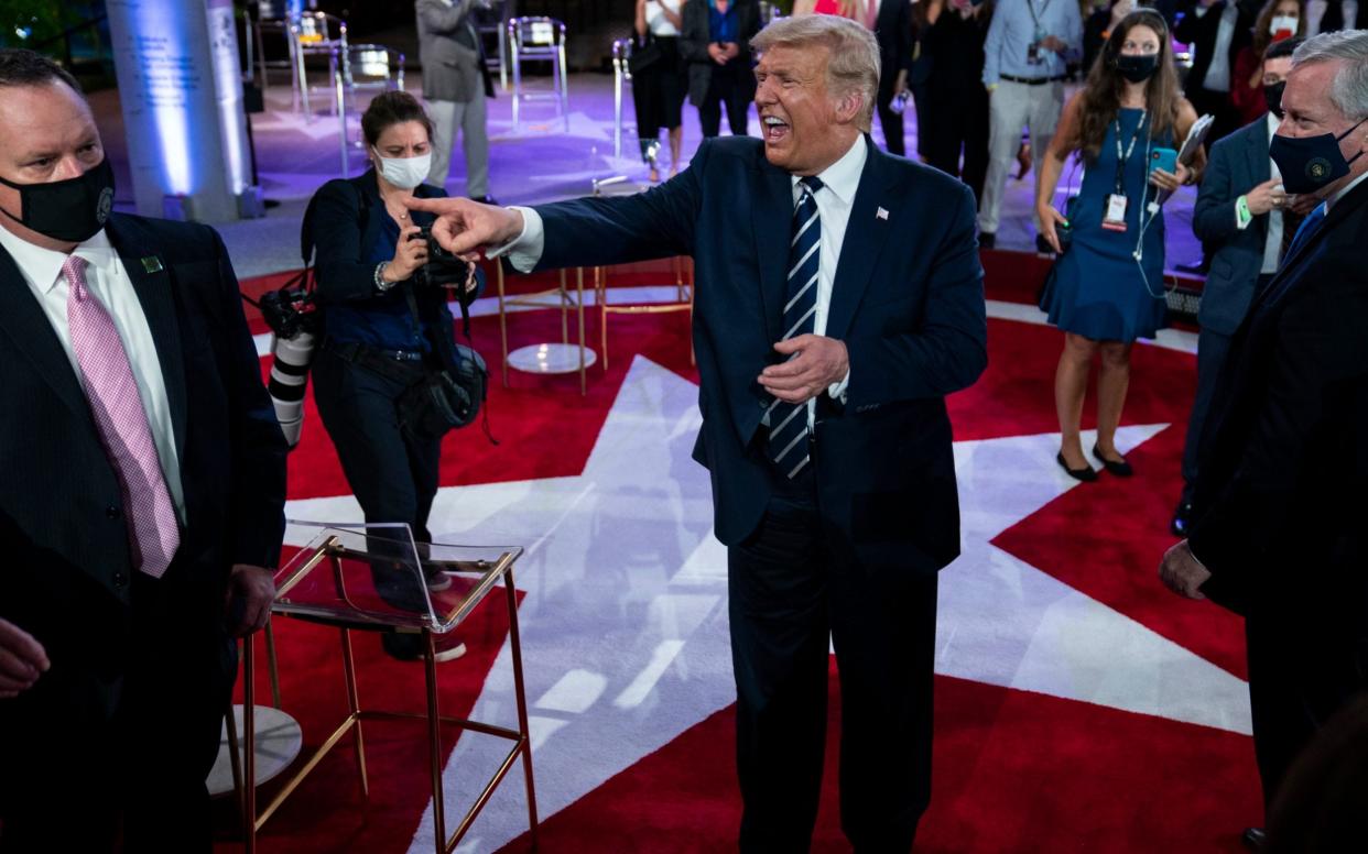 Donald Trump talks with voters after an NBC News Town Hall - AP