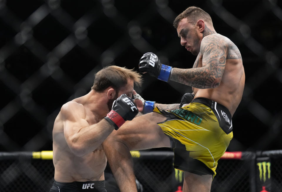 NEW YORK, NEW YORK - NOVEMBER 12: (R-L) Renato Moicano of Brazil knees Brad Riddell of New Zealand in a lightweight bout during the UFC 281 event at Madison Square Garden on November 12, 2022 in New York City. (Photo by Chris Unger/Zuffa LLC)